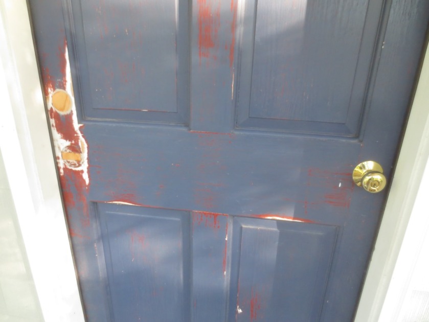 Before painting the door I washed it with soapy vinegar water to get off the old grime.